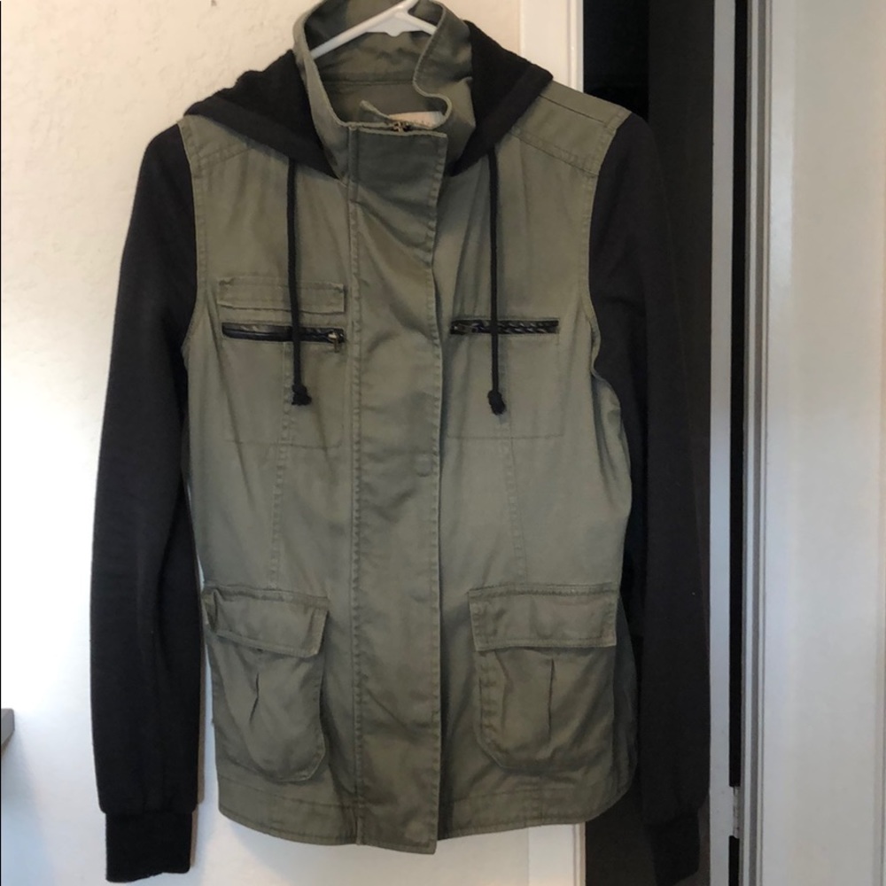 Green jacket with black sleeves. Size small.